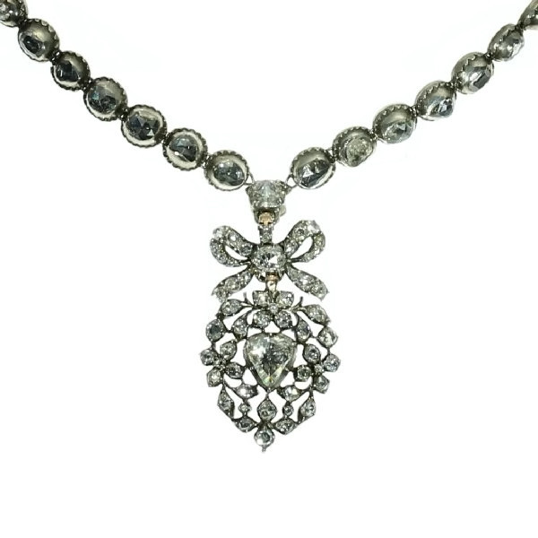 Rose cut diamond riviere necklace with a diamond set crowned heart pendant